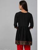 Viscose Rayon A-line Chitrarekha Superior Kurti, black yoke design, three-quarter sleeves, printed combo. Indian women's fashion on mannequin