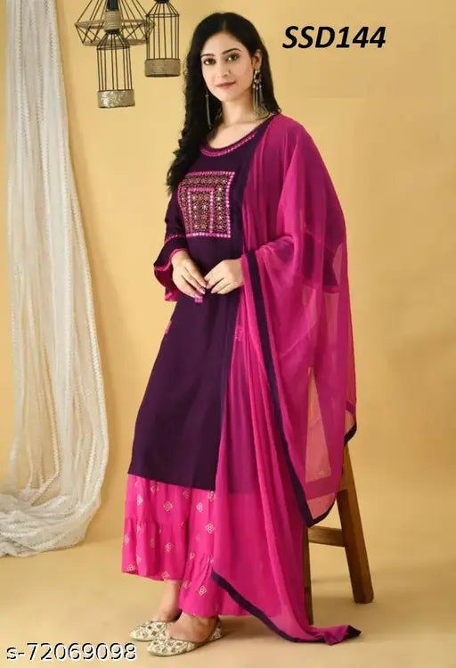 Purple and pink traditional bridal sharara outfit, embroidered Rayon set with dupatta and bottomwear. Women's ethnic bridal attire from India