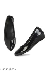 Black synthetic ballerinas, stylish and comfortable for women's bellies, slip-on design