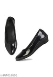 Black synthetic ballerinas, stylish and comfortable for women's bellies, slip-on design
