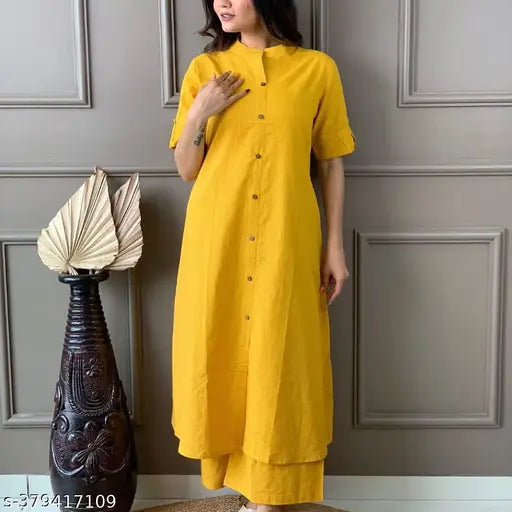 Yellow cotton kurta plazo set with pockets, solid design, three-quarter sleeves