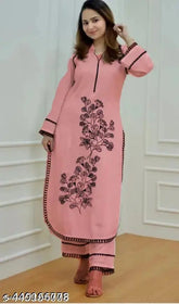 Rayon embroidery coord set: Kurta pant set with three-quarter sleeves, embellished in black butta, Pakistani origin