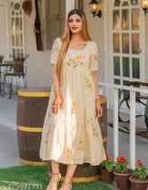Women's regular fit, floral print rayon kurta. Short sleeves, variety of necklines. Versatile style for summer fashion