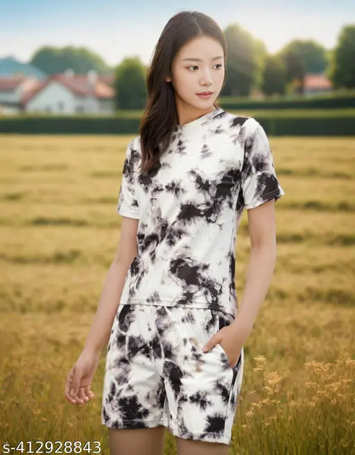 Tie-dye women's jogger set with baggy shorty and t-shirt, printed top and shorts in versatile stretchable premium knitted Jeggings, ideal for party wear & daily wear. Made from 95% super combed cotton and 5% spandex, Azo-free dyes, India origin