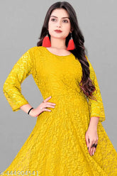 Embroidered green printed long gown with three-quarter sleeves and round neck, ideal for party wear and festive occasions. Indian-made women's elegant dress