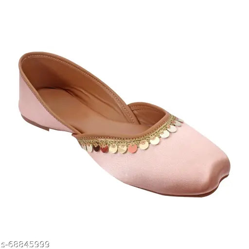 Voguish synthetic bell-bottom ballerinas in premium Lycra and patent leather, embellished for formal, casual, party, ethnic, or wedding wear. Slip-on design for lasting comfort." (124 characters)