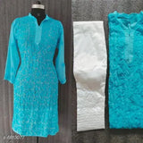 Women's printed georgette kurta with lycra palazzos, three-quarter sleeves and net pattern on display