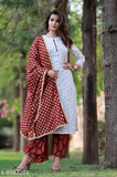 Stylish cotton kurta pant set in vibrant print, three-quarter sleeves. Cotton & rayon bottomwear. Indian-made fashion