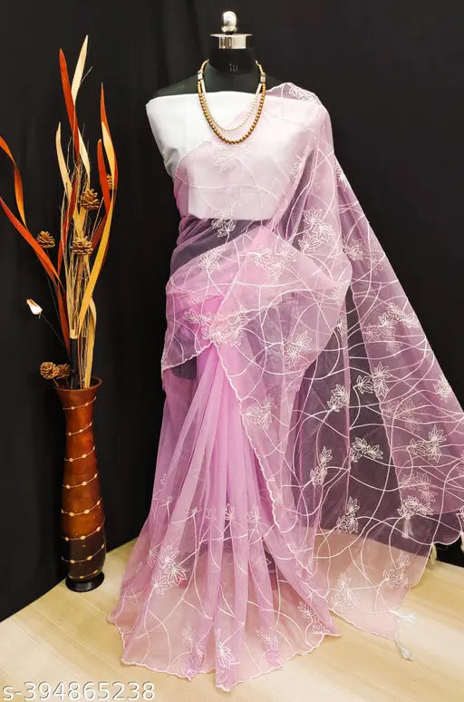 Designer net saree, embroidered with new patterns for partywear and wedding collection 2024, available in various colors like white, blue, yellow, green, red, pink, maroon, black, peach, and orange. Free size, originating from India