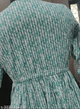 Women's green cotton calf-length dress, three-quarter sleeves, fit and flare, printed combo on Indian fabric