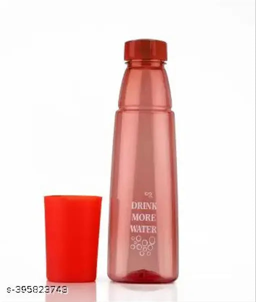 Pink plastic kids sipper bottle, leak-proof with a capacity of 000 ml on table