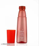 Pink plastic kids sipper bottle, leak-proof with a capacity of 000 ml on table