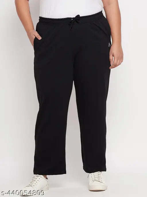 Black cotton plus-size loungewear pants with side pockets, soft and breathable for relaxed comfort