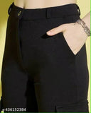 Black cotton lycra high-waisted cargo pants, versatile for formal or casual wear, side pockets for practicality
