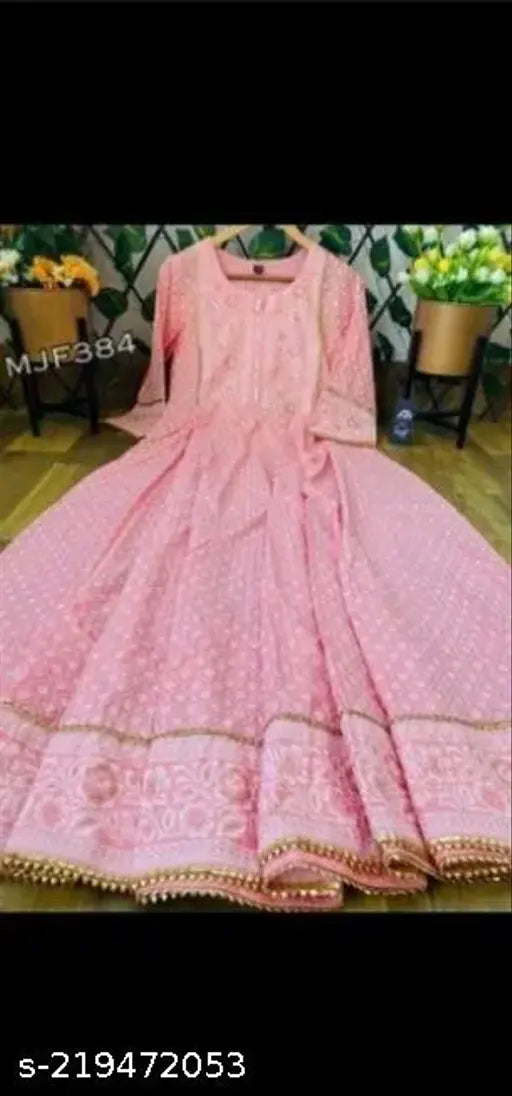 Peach printed rayon anarkali kurtis with three-quarter sleeves, popular Indian fashion for women