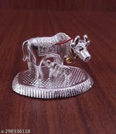 Silver brass Kamdhenu cow with calf statue, traditional Indian animal figurine