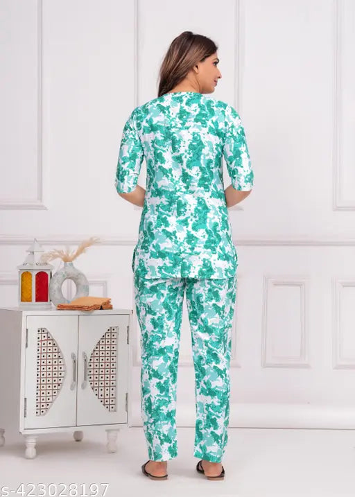 Beautiful rayon printed nightsuit for women, featuring three-quarter sleeves and pyjama style. Made in India