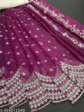 Embroidered dupion silk and net semi-stitched Lehenga Choli with cutwork border, trendy Indian bridal wear on display
