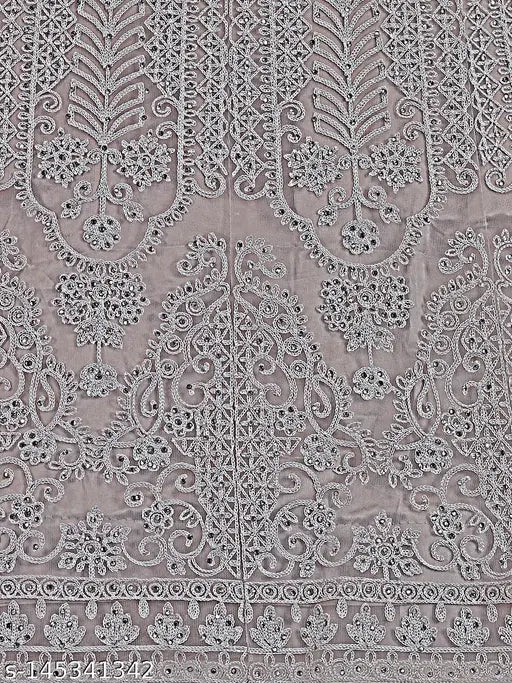 Trendy net semi-stitched women's lehenga choli and dupatta with embroidered patterns, India origin