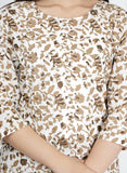 White and brown cotton Kurta Palazzo Set for women, featuring printed net pattern and three-quarter sleeves