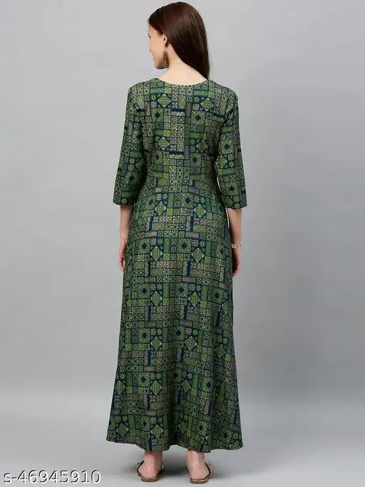 Dark green Mughal printed rayon slub fabric Anarkali dress with three-quarter sleeves, ideal for women's ethnic wear. Indian-origin Rayon Anarkali dress on model