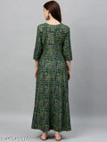 Dark green Mughal printed rayon slub fabric Anarkali dress with three-quarter sleeves, ideal for women's ethnic wear. Indian-origin Rayon Anarkali dress on model