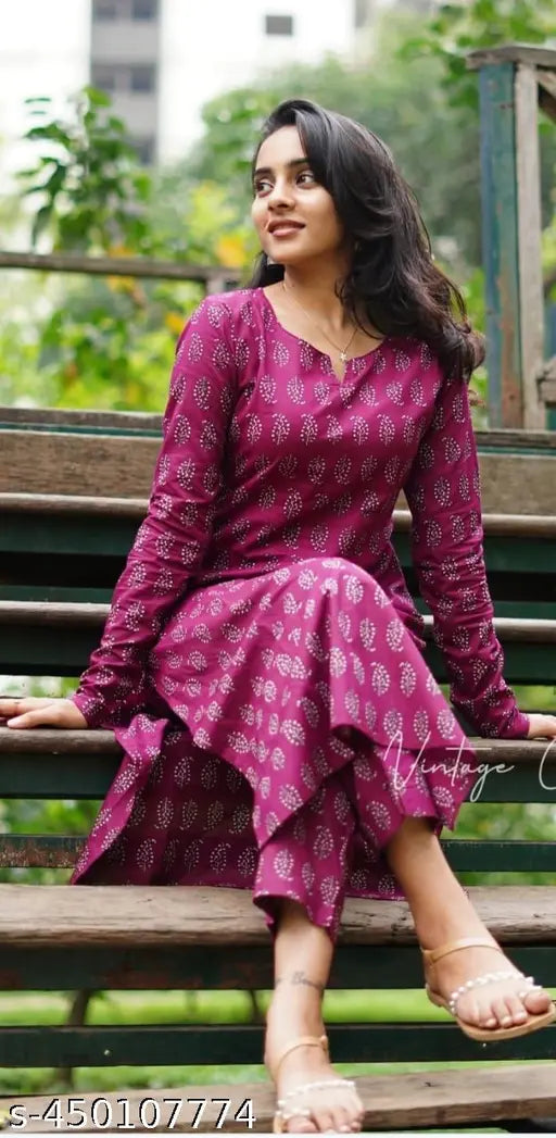 Pink viscose rayon kurti and pants with long sleeves and printed net pattern, single set for women