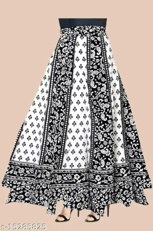 Attractive cotton ethnic skirt, printed net design for women's occasion wear. Available in sizes 24-44 & free size (waist 46in, length 50in). Indian origin