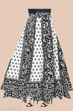 Attractive cotton ethnic skirt, printed net design for women's occasion wear. Available in sizes 24-44 & free size (waist 46in, length 50in). Indian origin