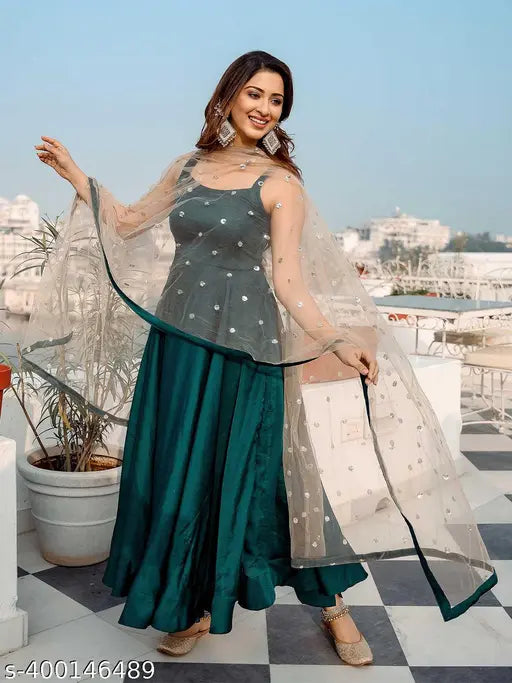 Merald green art silk Anarkali gown with net dupatta, perfect for Indian women's parties or weddings