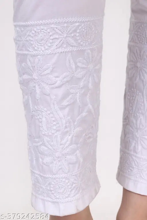 White cotton lycra pant with floral computer embroidery, elastic waistband with drawstrings and single pocket, women's style from India