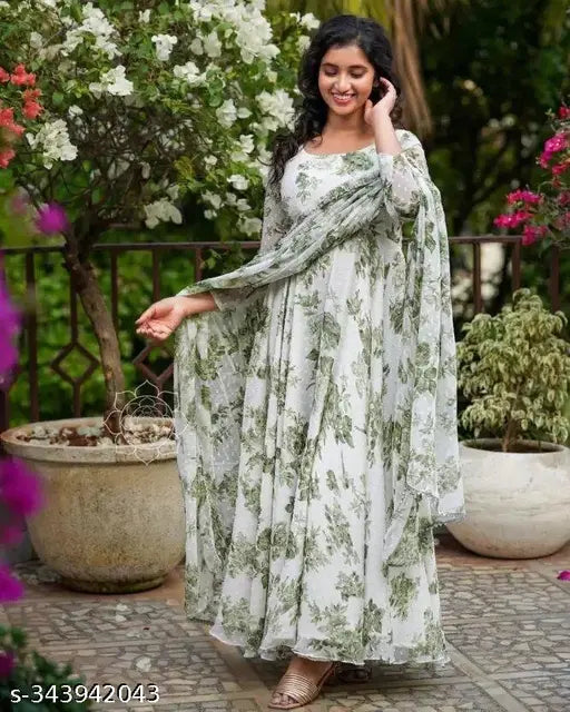 Green Georgette Chikankari Anarkali Kurta Set, printed with intricate floral patterns. S: bust 36in, waist 34in, hip 38in, shoulder 13in. Long sleeves kurti pant set for women