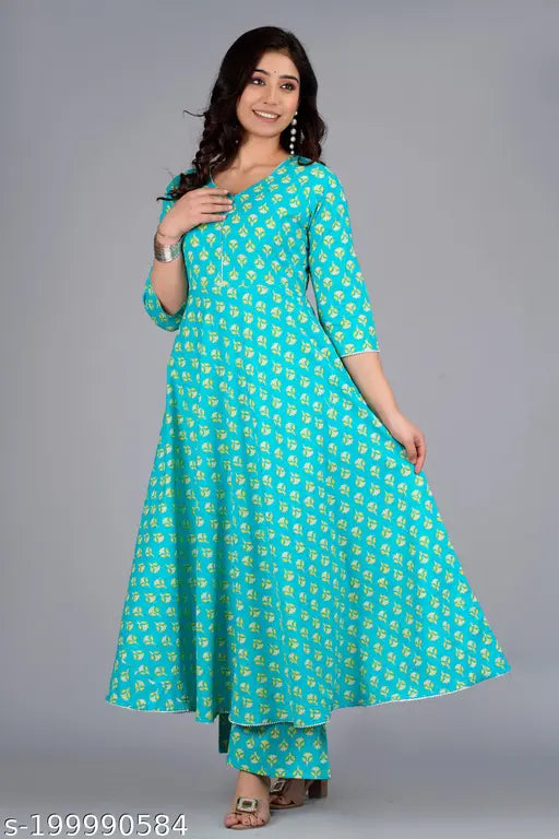 Women's cotton rayon Kurta and Palazzo set, three-quarter sleeves, printed net pattern. Affordable, versatile alternative to silk and linen. Indian-origin designer kurti collection