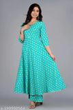 Women's cotton rayon Kurta and Palazzo set, three-quarter sleeves, printed net pattern. Affordable, versatile alternative to silk and linen. Indian-origin designer kurti collection