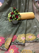 Blue floral embroidered net saree with tassels, art silk blouse piece - Indian designer party wear