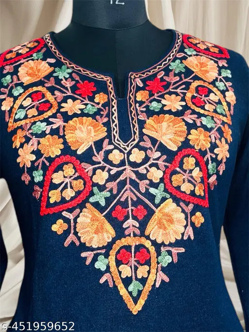 Black woolen knitted kurta with Kashmiri embroidery, three-quarter sleeves, chikankari design. Exudes elegance and warmth. Size M (Bust 38in, Length 42in), L (Bust 40in, Length 42in), XL (Bust 42in, Length 42in), XXL (Bust 44in, Length 42in). Traditional Indian handcraft