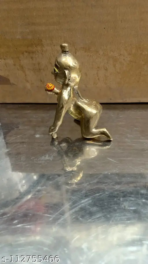 Brass Krishna idol, size 2, blue-eyed Indian deity figure