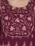 Rayon wine-colored women's and girls printed gold kurti with sharara sets, three-quarter sleeves, accessorized with lace work on yoke and sharara, India origin