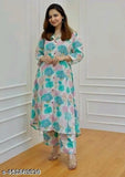 Rayon printed kurta set with pants, featuring three-quarter sleeves and vibrant Indian print. Set includes sizes M, L, XL, XXL, XXXL. High-quality rayon fabric from India