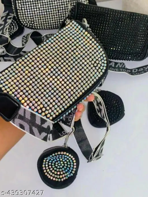 Blue PU rhinestone sling bag with 2 compartments, embellished net pattern, detachable pouch, adjustable strap. Premium quality fabric and heavy-duty zips, superior to market standard. Made in China