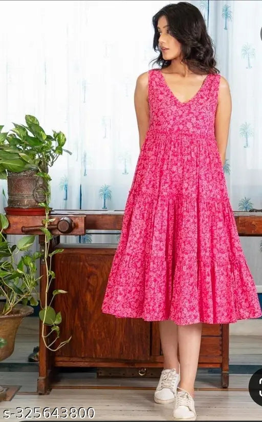 Pink rayon sleeveless print dress, vibrant floral design for women's party wear, stylish V-neck fit & flare style from India