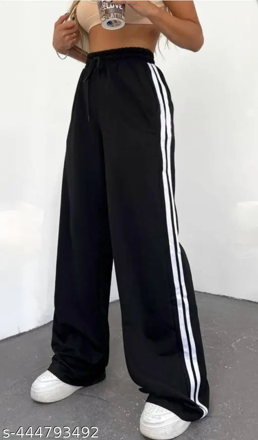 White cotton blend Patti Trouser pant, solid net stripe design for women's sizes S-XXXL. Comfortable jogger pajamas with two side stripes and pockets. Made in India