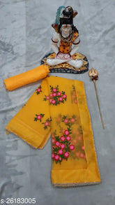 Mustard net saree with floral embroidery and pearl borders, elegant Indian wear for occasions