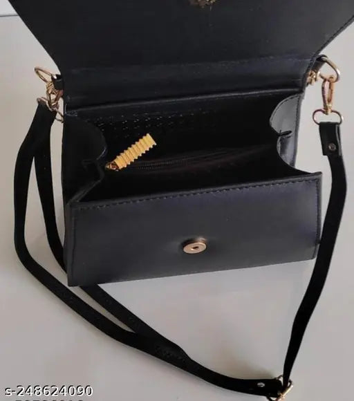 Black leather cross-body sling bag, featuring 2 compartments, perfect for everyday use by girls