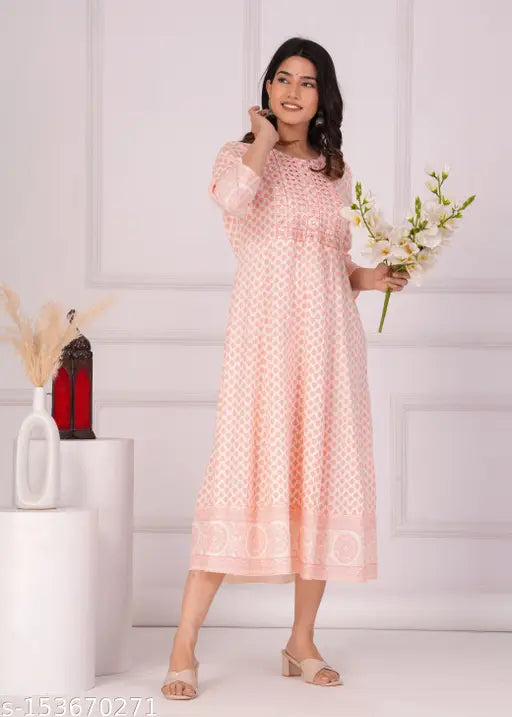 Baby pink rayon Anarkali Kurta, intricately embroidered with traditional Indian motifs, perfect for summer