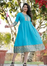 Rayon A-Line kurti, trandy sky blue border print on solid background, three-quarter sleeve length. S (36in bust), M (38in bust), L (40in bust), XL (42in bust), XXL. Indian-made Anarkali kurta fashion