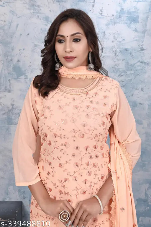 Georgette embroidered kurti set with sharara and dupatta, three-quarter sleeves, printed Indian traditional outfit on mannequin