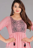 Embroidered Rayon GSMULTI pink kurta with blue details, three-quarter sleeves. Available in various sizes: S - 36in bust, M - 38in bust, L - 40in bust, XL - 42in bust, XXL - 44in bust, XXXL - 46in bust, 4XL - 48in bust, 5XL - 50in bust. Made in India