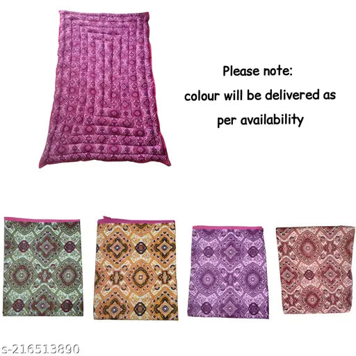 Multi-colored, reversible, floral print organic cotton winter quilt (60x84 inches), ideal for single bed. Soft, lightweight, and breathable, suitable for summer and winter use