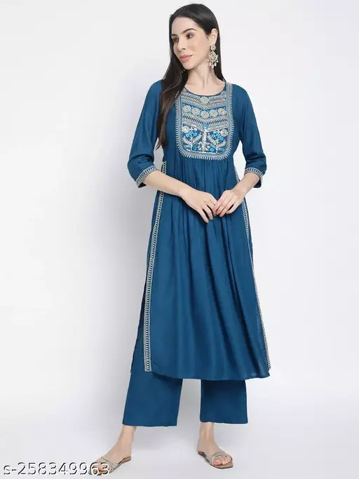 Blue rayon embroidery kurta palazzo set, featuring intricate designs and solid blue color. Perfect for festive occasions or a chic day out